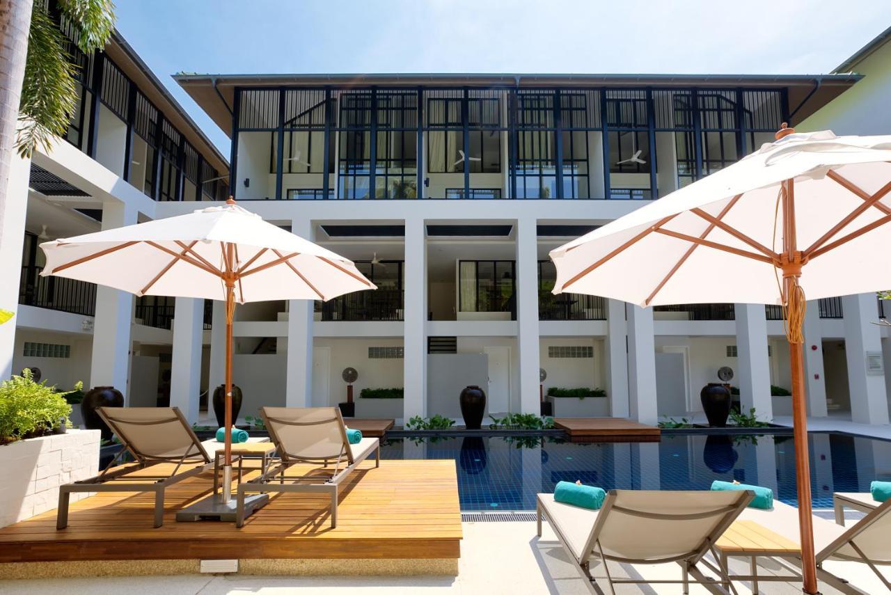 Outrigger Surin Beach Resort - SHA Extra Plus Exterior foto The hotel's pool