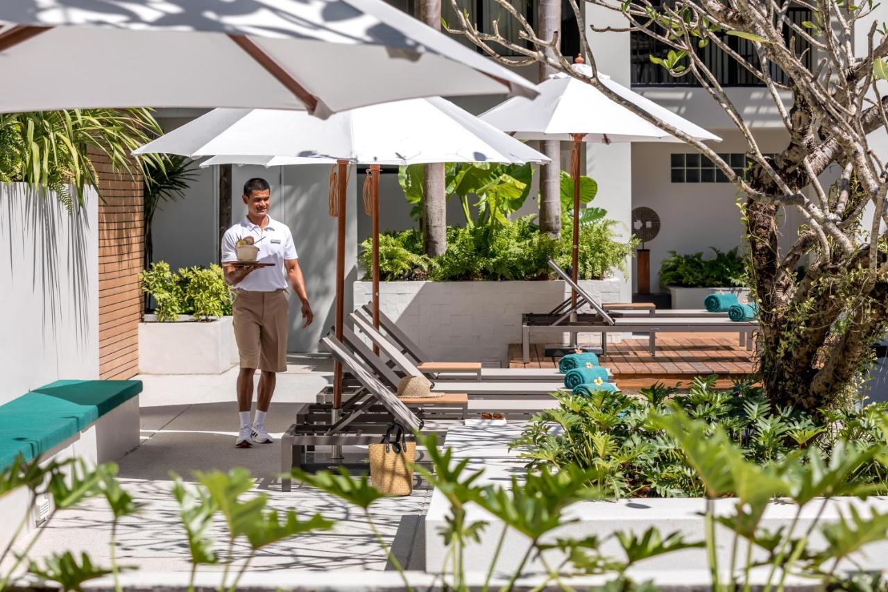 Outrigger Surin Beach Resort - SHA Extra Plus Exterior foto The hotel's pool