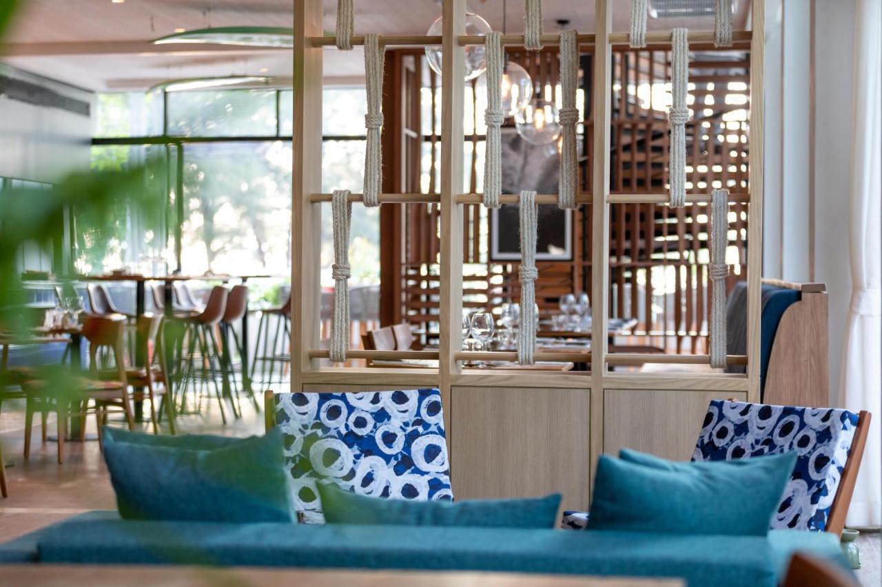 Outrigger Surin Beach Resort - SHA Extra Plus Exterior foto The restaurant